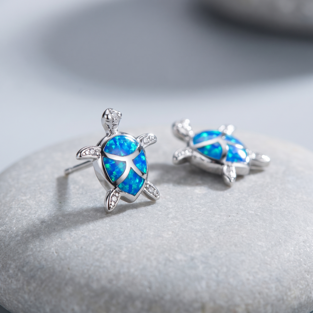 The Babies Earrings: blue opal baby sea turtle studs in sterling silver