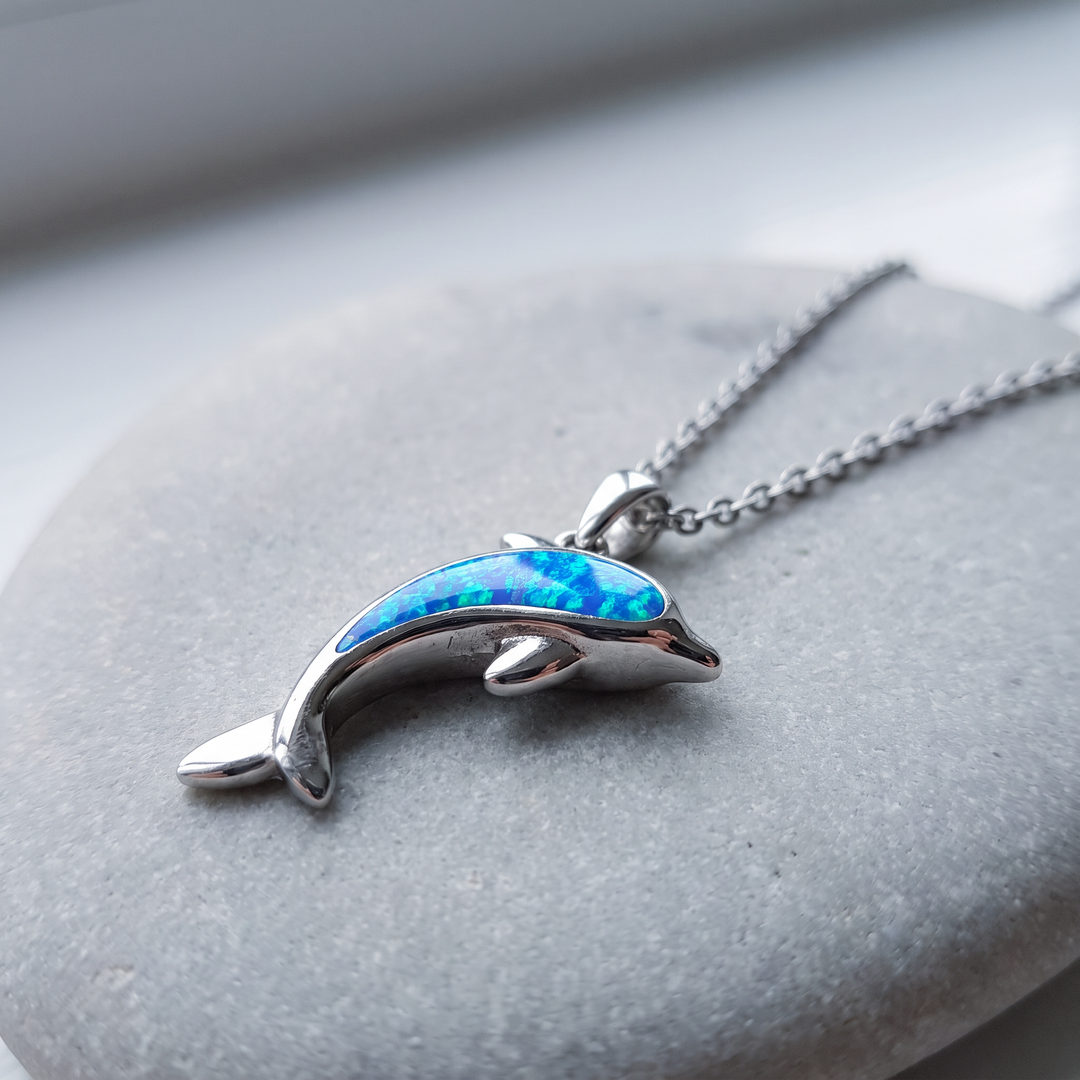 Dolphin Necklace: blue opal dolphin pendant in sterling silver