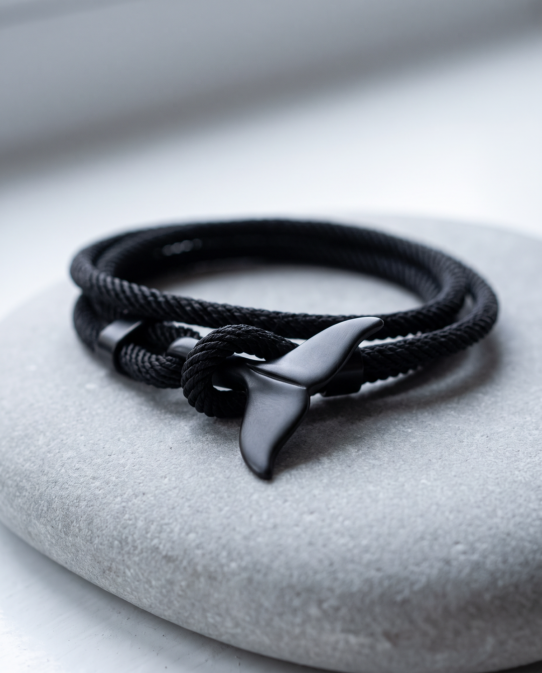 Marine Life Bracelet with whale-tail clasp on grey stone