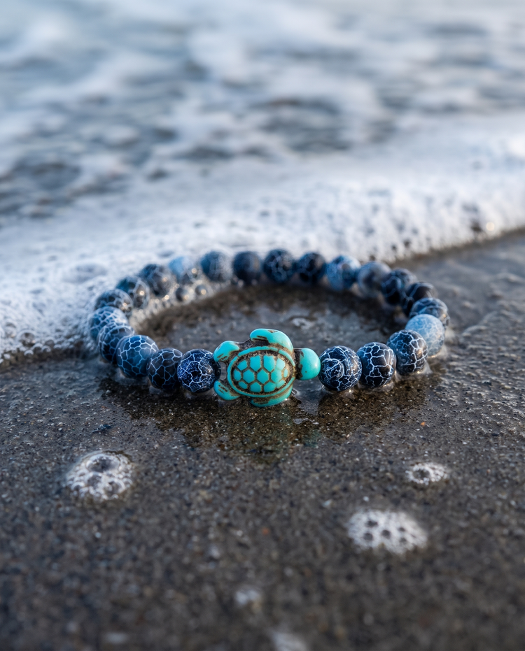 Deep Blue Bracelet on wet sand