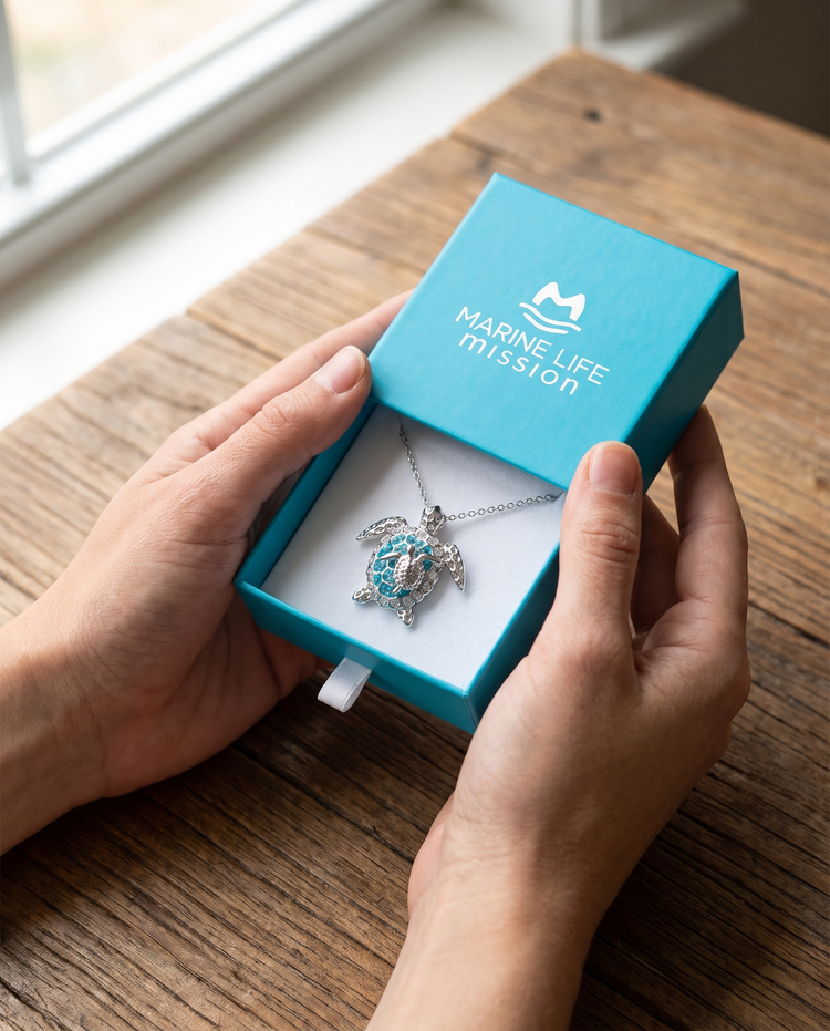 Mother and Baby Necklace in the Marine Life Mission gift box